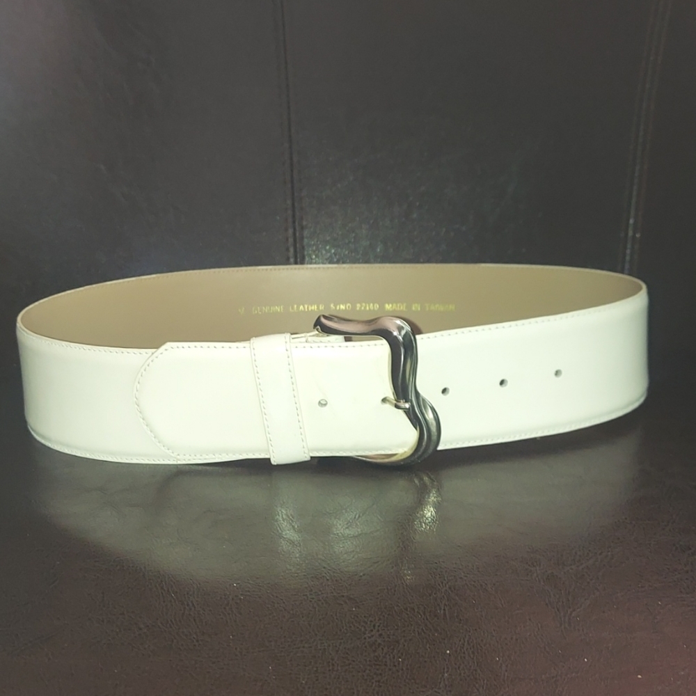 Genuine leather 2" wide belt with silvertone buckle.